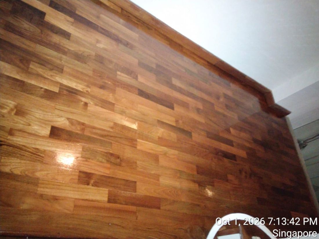 Gloss-varnished timber stair landing