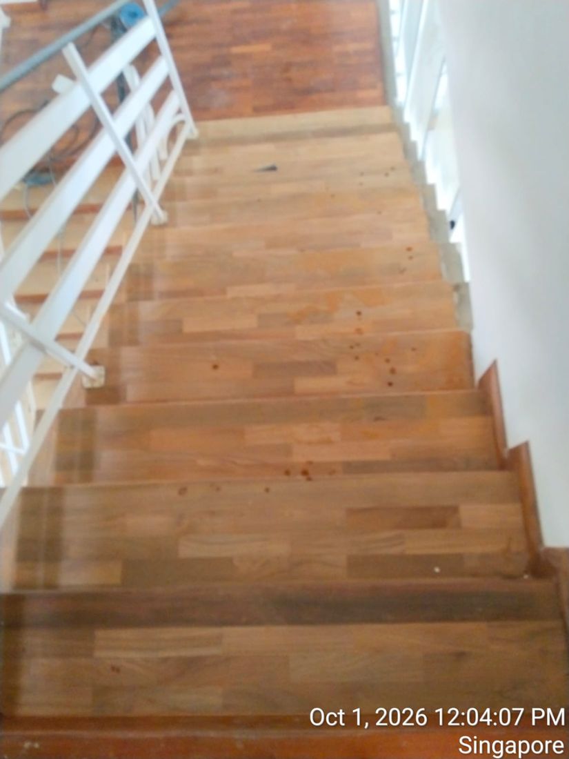 Worn timber staircase with scratched, dull treads before sanding